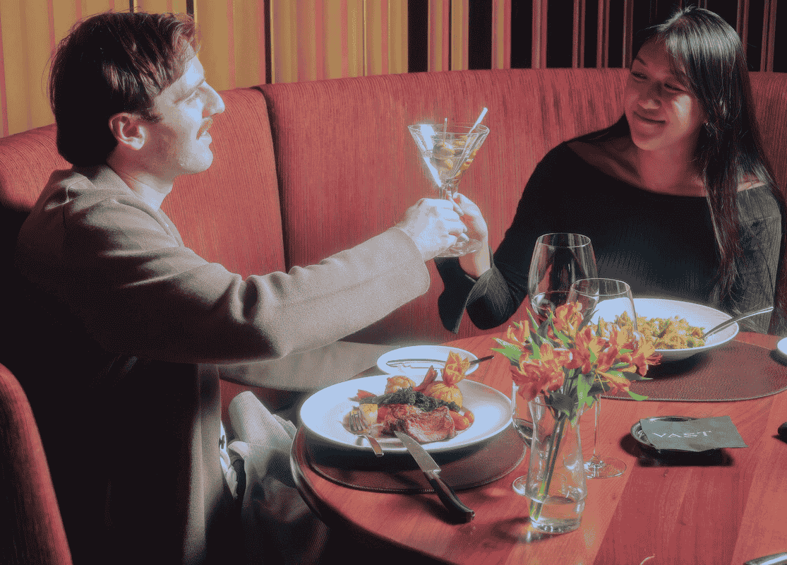 Couple Having Cocktails and Dinner Vast Devon Tower Downtown OKC